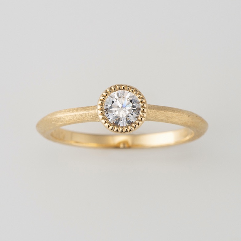 ミルグレインをあしらったビンテージ風の婚約指輪